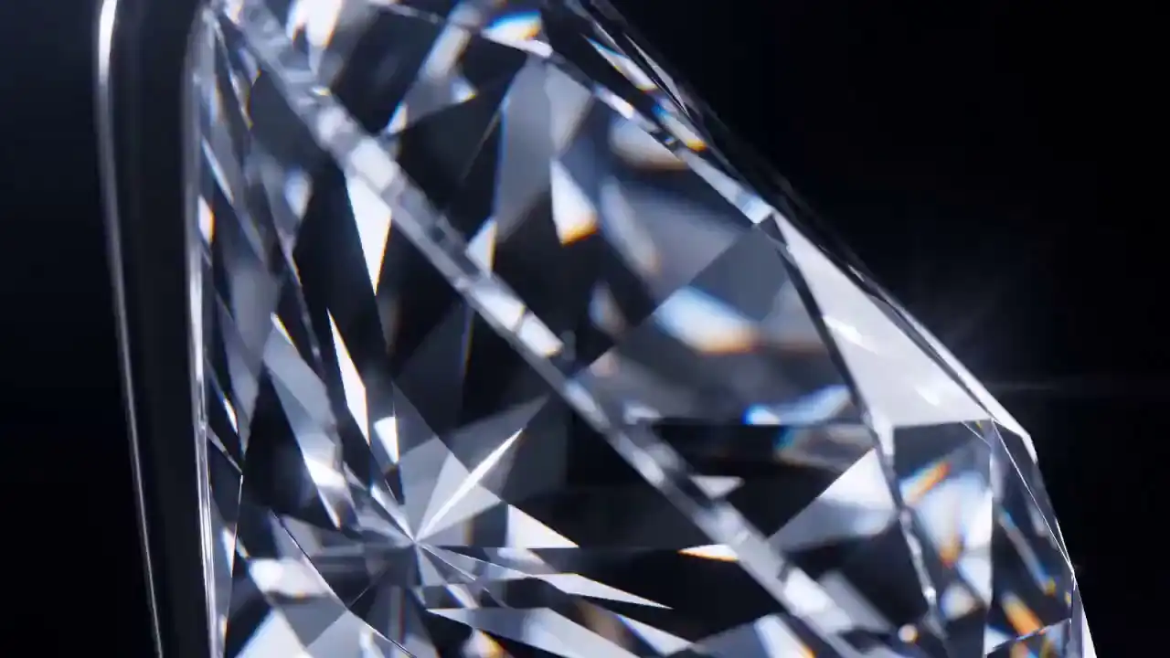 A sparkling diamond rotates under dramatic dark studio lighting in a detailed macro shot using Seedance 2.0.
